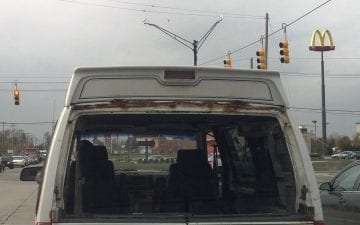 Busted GMC Safari Van - Busted by Busted Ride