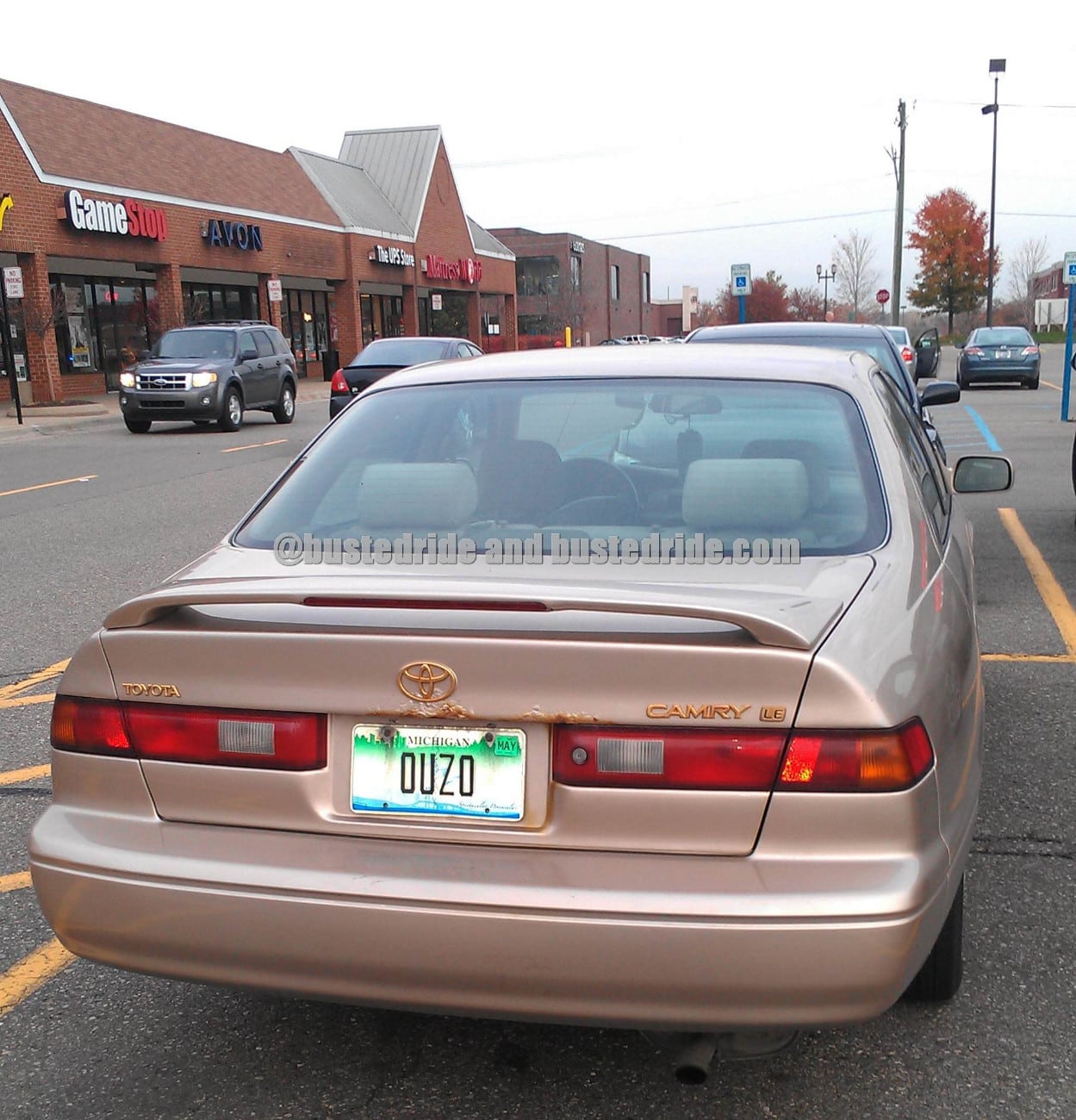 Ouzo ! Happy New Years! - Vanity License Plate by Busted Ride