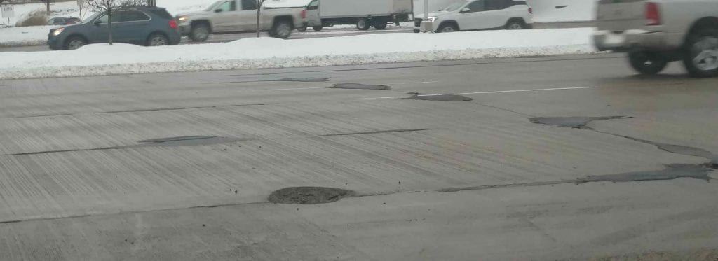 busted michigan roads