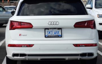 SMILWNK - Vanity License Plate by Busted Ride