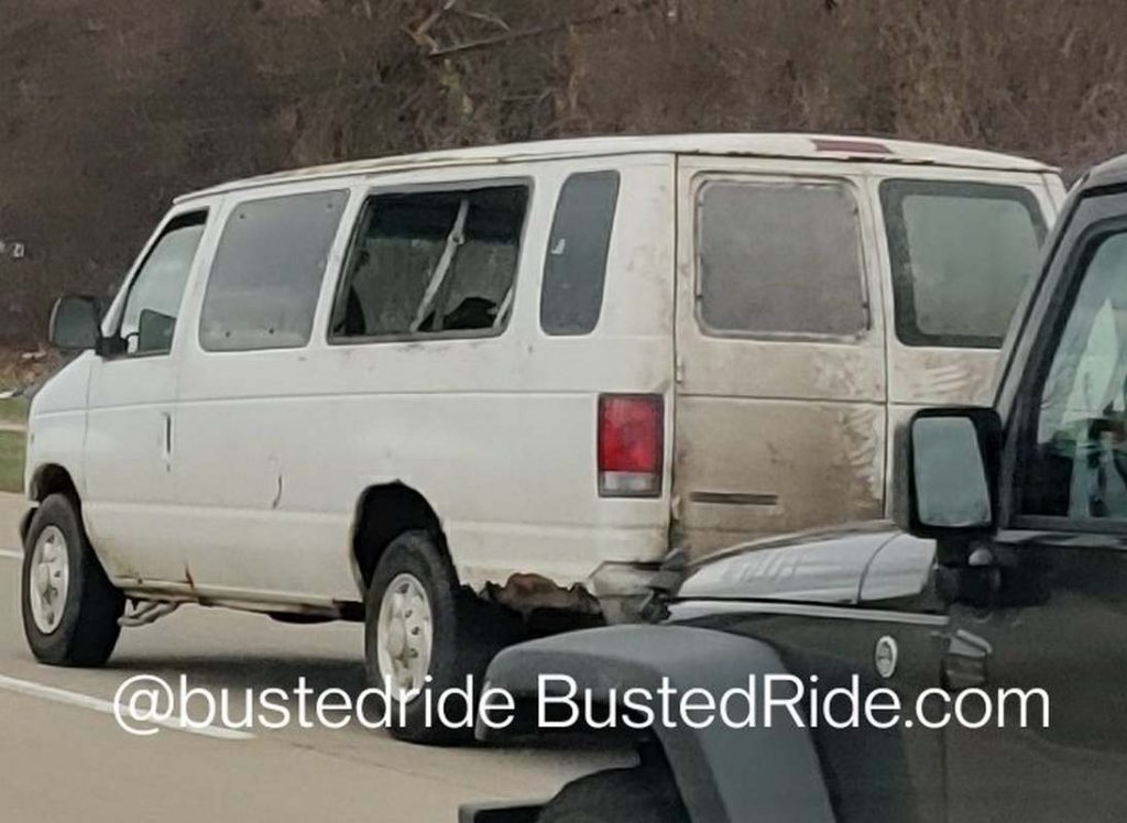 Busted Ford Econoline Van Rear Windows