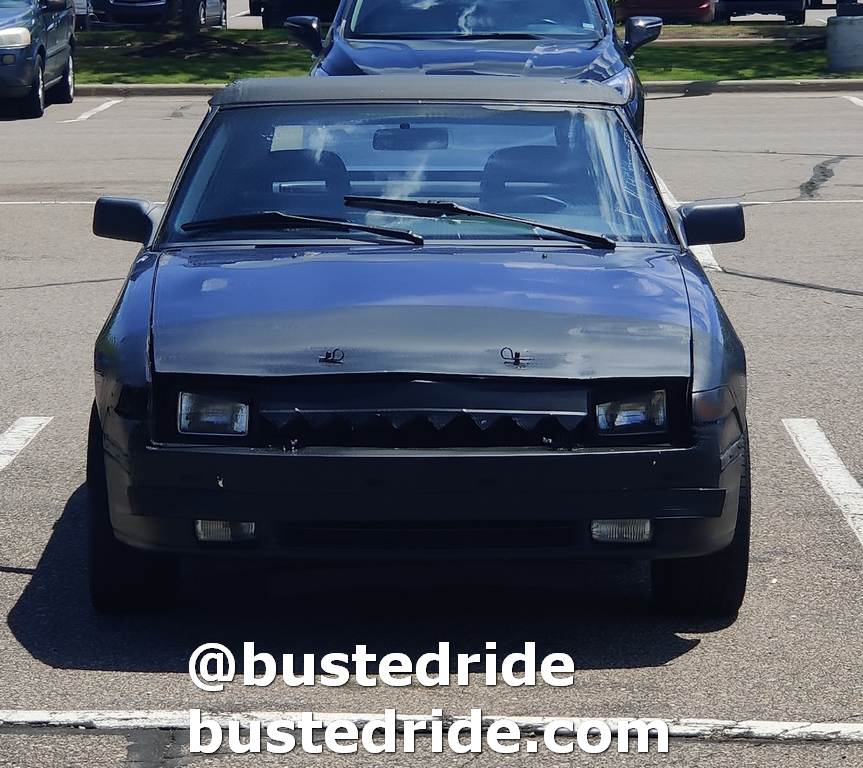 Weird Car Ford Capri with Meth face - Vanity License Plate by Busted Ride